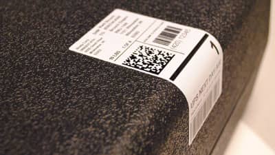 A label applied the edge of an equipment case demonstrating its flexible nature.